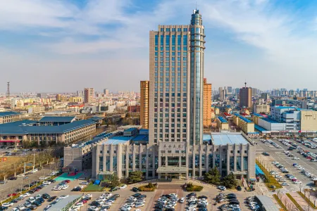 Donsheng Hotel Отели рядом с достопримечательностью «Huanghe Sanjiaozhou Zoo»