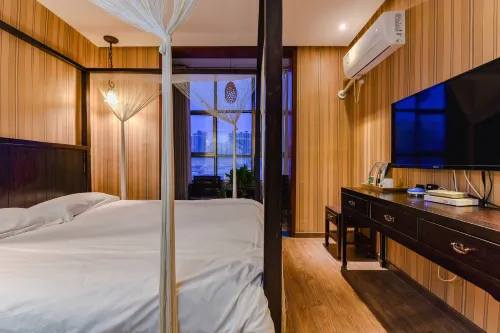 Zhan'en Yiju Hotel (Shangqiu Wanda Plaza) - Inns