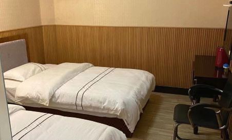 Wushan Kaiyue Business Motel - Housity
