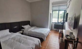 Pengzhou Longmen Xiaozhu Homestay
