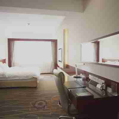 Deyuan Grand Hotel Rooms