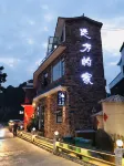 Homeland Dreamland Boutique Hostel Hôtels à proximité de : Xingyi Sports Center