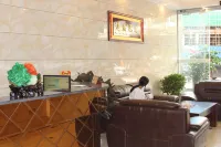 Changchi Town Plaza Business Hotel - Losmen
