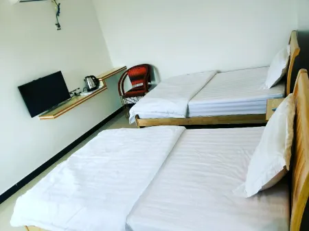 Hongshenglou Hotel Отели рядом с достопримечательностью «Langqin Bay»