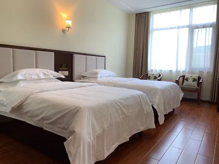 Dongli Chinese Inn (Changde Taohuayuan Scenic Area) Отели в г. Таоюань