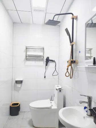 Hezhang Yasheng Apartment Отели рядом с достопримечательностью «Ahsilisi Jiucaiping»