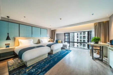 Echarm Hotel (GuiyangHuaxi University Town, State Guest House of the United States) Отели рядом с достопримечательностью «Mingde College of Guizhou University (Huaxi Campus)»