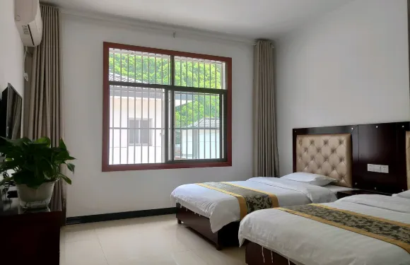 柞水姣榮雅居酒店