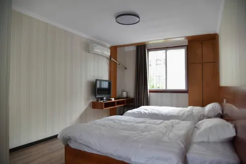 Huainanxiang Weiyuan Guest House - Inns