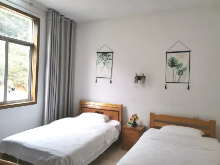 Yuexi Wangyue Yashe Farmhouse Отели рядом с достопримечательностью «Miaodao Mountain»