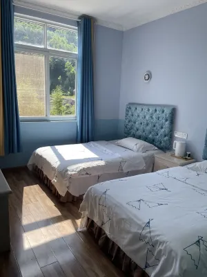 Pengzhou Bailuzhen Xiyou Homestay Hotels near Bailu Town