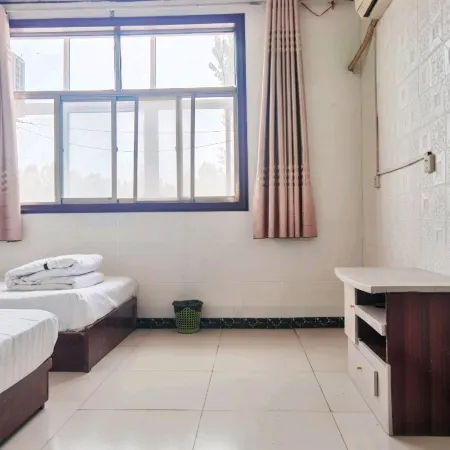 Sishui Jindiyuan Business Hotel