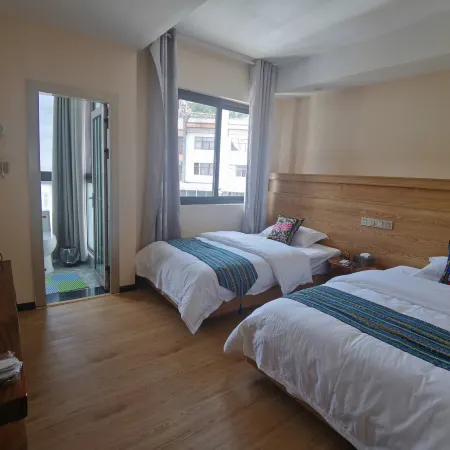 Mojiang Xile Inn Отели в г. Моцзян