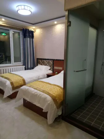 Tahe Xinpeng Hotel Отели в г. Тахэ