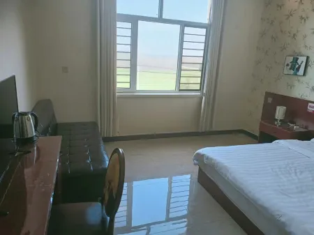 Hui Xing Hotel Отели в г. Чжаосян