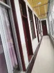 Pingyi Liangshi Supermarket Hotel - Losmen