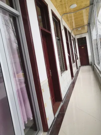 Pingyi Liangshi Supermarket Hotel Отели рядом со станцией Mengshan Railway Station