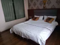 Huaning Yuxing Homestay - Inns