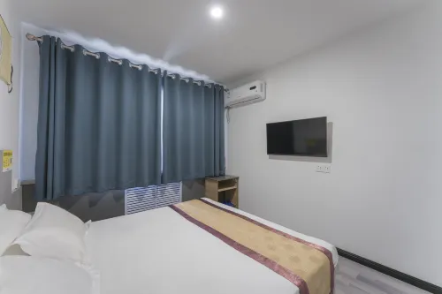 Huanhuan Hotel (Xiayuan Commercial City) - Losmen