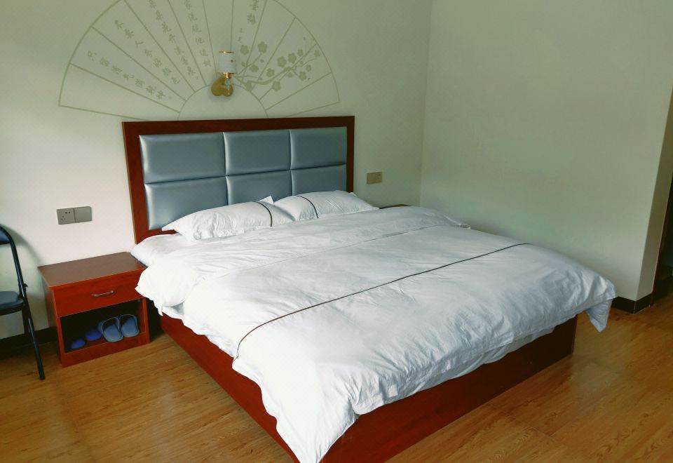 솽파이 우청루 호텔의 객실 내부