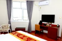 Ejina Qi Taibo Business Hotel - parkir
