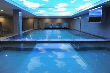 Jinyong Hotel, Wenshui Отели рядом с достопримечательностью «Lvliang Administration College Wenshui Branch»