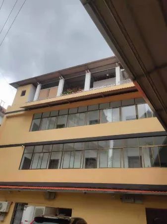 Mengla Yishang Business Hotel