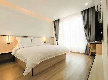 Muqi Hotel (Panzhihua South Railway Station Branch) Отели рядом с достопримечательностью «Datian Convention Relic Site»