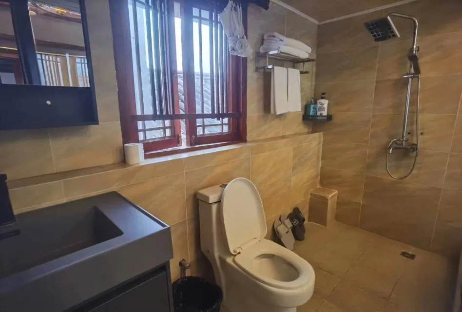 Delamu Youth Inn Zimmer Photos