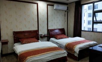 Songtao Xingyuan Business Hotel