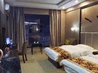 Nanzhang Huatian Business Hotel Отели рядом с достопримечательностью «Южный Тулунг»
