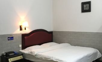 Pingle Xingfu Hotel