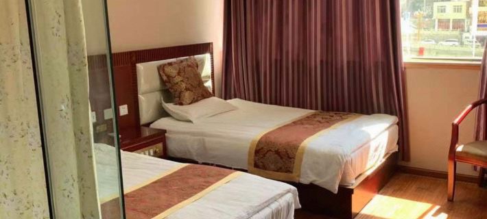 Xinlong Wangjiang Business Hotel Hotels in Xinlong
