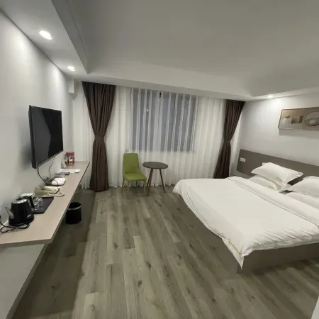 Guannan Qianxin Business Hotel