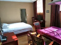 Yilong Huasheng Business Hotel Hotels in Yilong