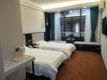 Xiuwu Ailü Boutique Homestay Отели в г. Сюу