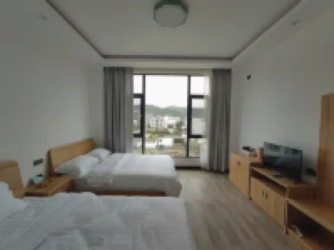 Luoping Chunri Xiaoyuan Homestay (Jinji Peak Cong Branch) فنادق في لوى بينغ