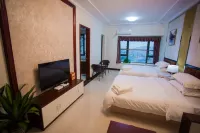 Dongman You + Hot Spring Holiday Apartment (Hengda Quandu) - شرفة