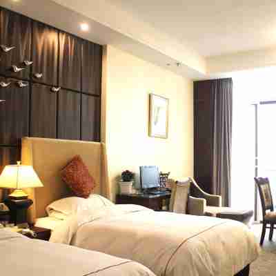 Mingyu Longgang Holiday Hotel Rooms