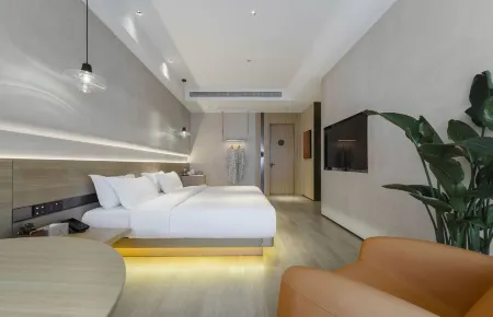 Hongye Taotao Hotel (Headquarters Center Wanda Branch) Отели рядом с достопримечательностью «Zhejiang Sci-Tech University Yongkang Teaching Station»