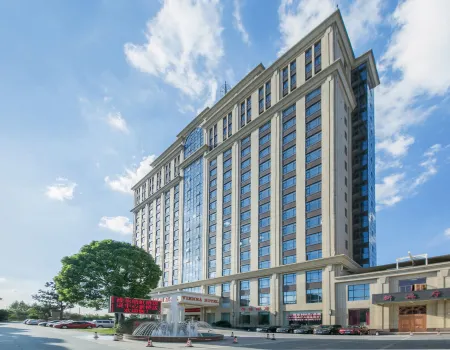 Vienna International Hotel (Shanghai Songjiang Xinqiao) Отели рядом с достопримечательностью «Jiuke Oasis Park»