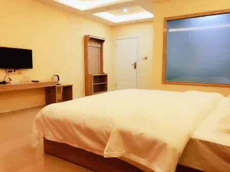 Yanggu Hospitality Business Hotel Отели рядом с достопримечательностью «Suhai Senlin Dongwu World»