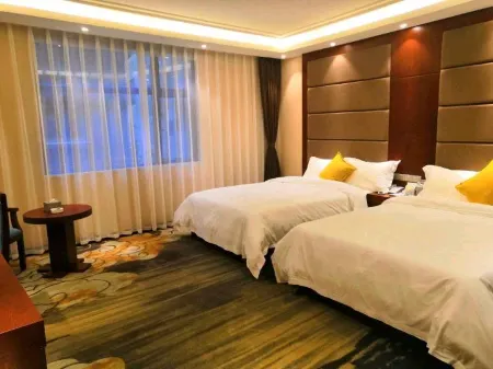 Zhenxiong Qingtian Business Hotel Отели рядом с достопримечательностью «Chishuiyuan Square»