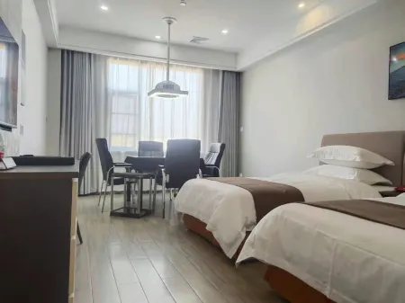 Gangli Hotel (Qianjiang Guanghua Jianing) Отели в г. Цяньцзян