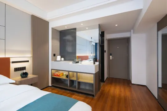 Liangzhi Huipin Hotel (Friendship Commercial Plaza Branch, Qilou Old Street, Haikou) Zimmer Photos