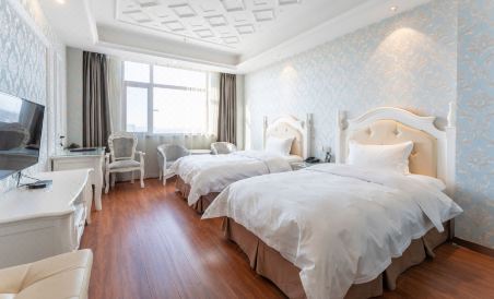 Xinwei Business Hotel - Housity