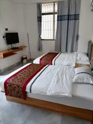 Xinchang Apartment Hotels in Binjiang Sports Stadium/ZhuXi ICEC