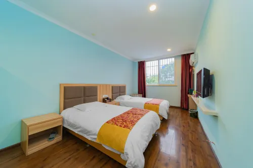 Zitong Aijia Business Hotel