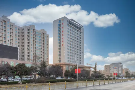 Shungeng International Hotel Отели рядом с достопримечательностью «Qilu University of Technology (Shandong Academy of Sciences) (Changqing Campus)»