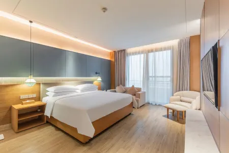 Vienna International Hotel (Baoting Center) Отели рядом с достопримечательностью «Qixian Square»